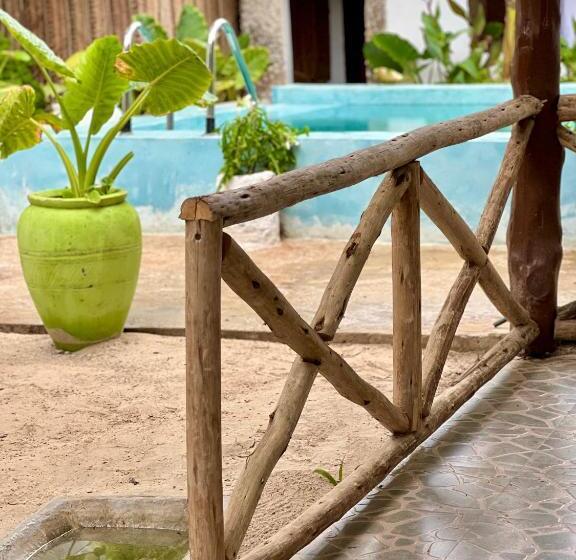 带阳台可观花园景的标准间, Jambiani White Sands Bungalows