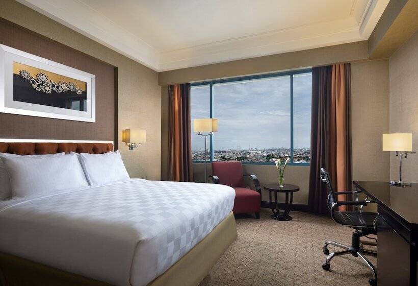 Номер Deluxe, Ciputra Semarang Managed By Swiss Belhotel International