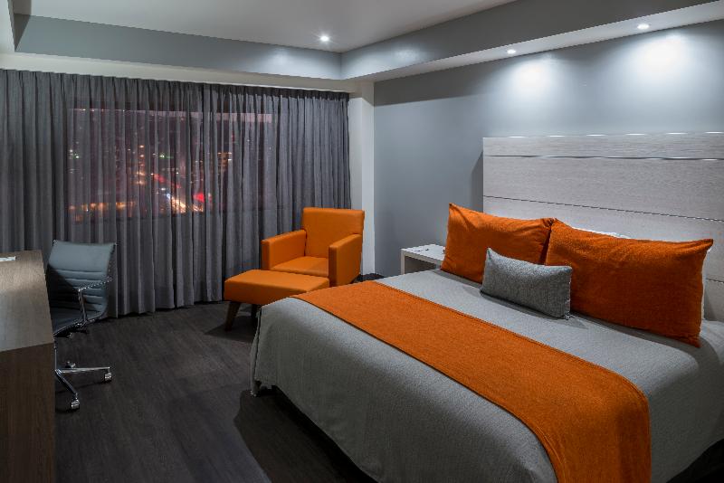 キングサイズベッドのデラックスルーム, Real Inn Tijuana By Camino Real Hoteles