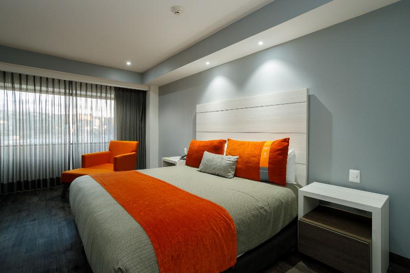 キングサイズベッドのデラックスルーム, Real Inn Tijuana By Camino Real Hoteles