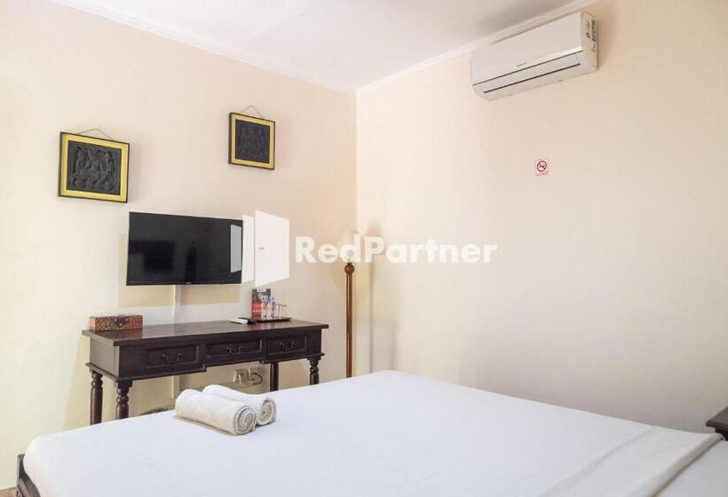 Номер Economy, Monginsidi Guest House Syariah Malioboro Yogyakarta Mitra Reddoorz