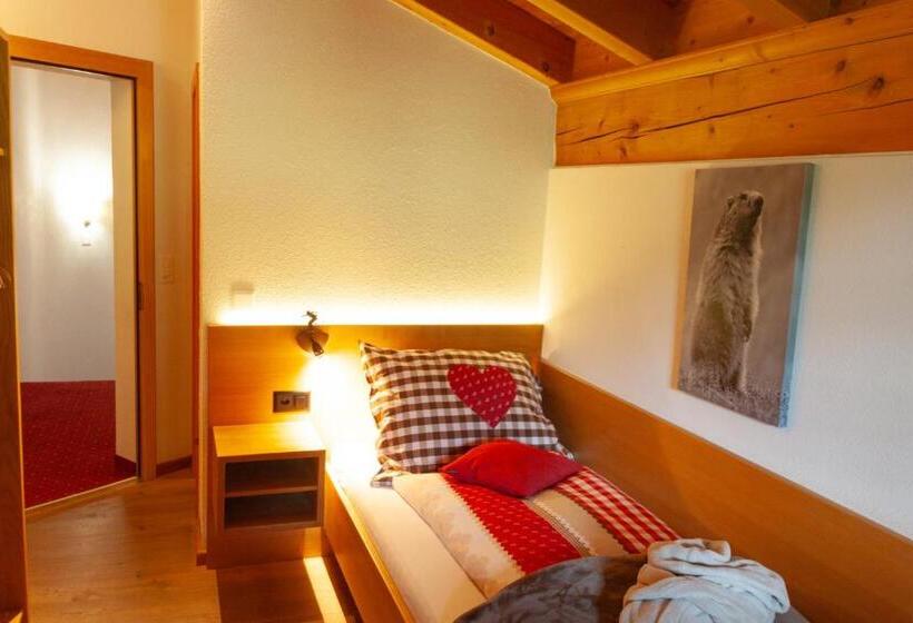 标准单人间, Madrisajoch