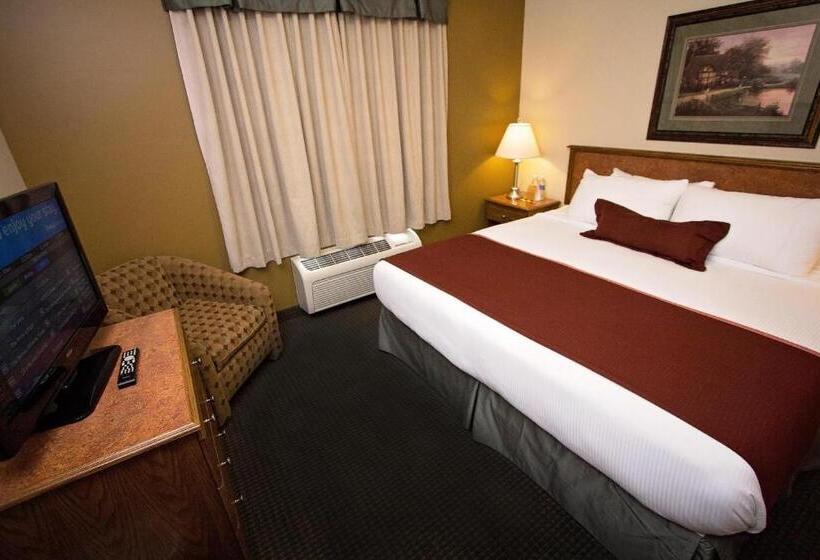 身障者適用キングサイズベッドルーム, Service Plus Inns & Suites Drayton Valley