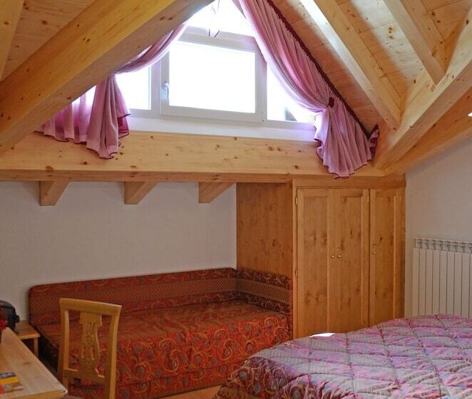 标准三人间, La Roccia