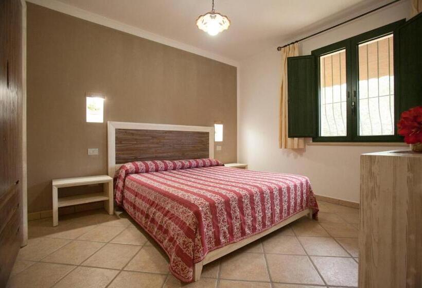 آپارتمان یک خوابه با دری مشترک که هال را جدا می کند., Masseria Tenuta Specolizzi