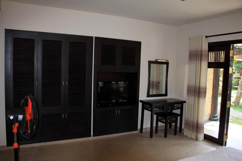 اتاق استاندارد با چشم‌انداز باغ, Lotus Village Resort