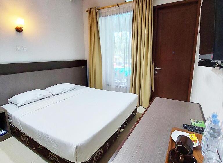 디럭스 룸 킹사이즈 침대, Sangga Buana Resort & Convention