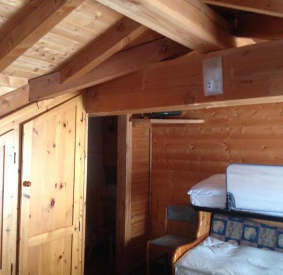 غرفة عائلية, Gran Baita