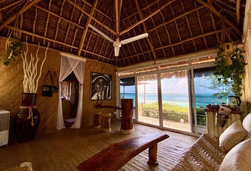 بانگلوی استاندارد با چشم‌انداز دریا, Rock And Sea Resort
