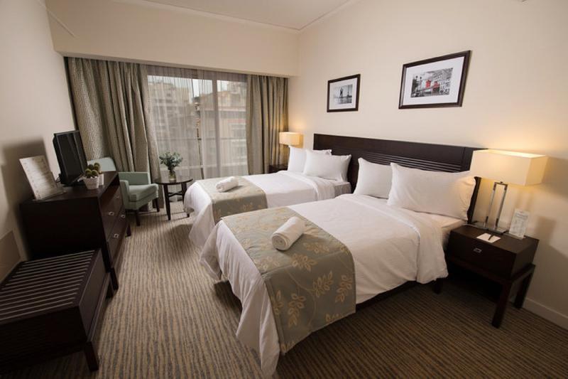 キングサイズベッドのデラックスルーム, Holiday Inn & Suites Sioux Falls   Airport, An Ihg