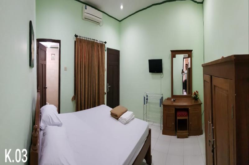 Номер Deluxe, Embe Pitoe Syariah Gejayan Mitra Reddoorz