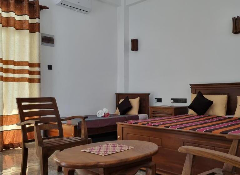 اتاق خانوادگی با چشم‌انداز دریا, Dhammika Beach Palace