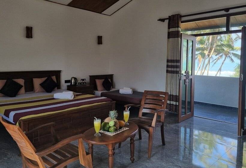 اتاق خانوادگی با چشم‌انداز دریا, Dhammika Beach Palace