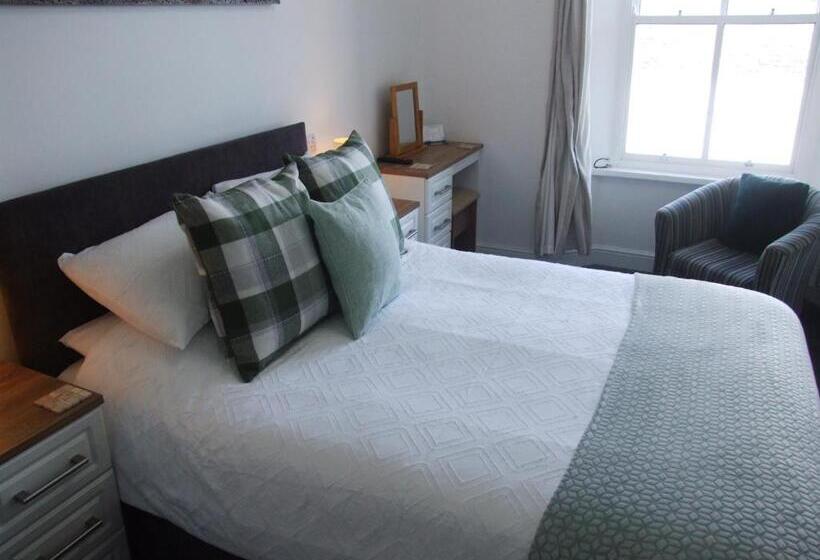 חדר דחוקס עם מיטת קינג, Coach Guest House