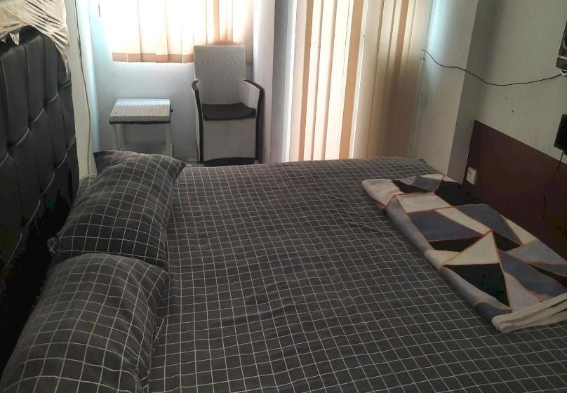 Номер Deluxe, Collection O 93386 Apartemen Grand Sentraland By Mira