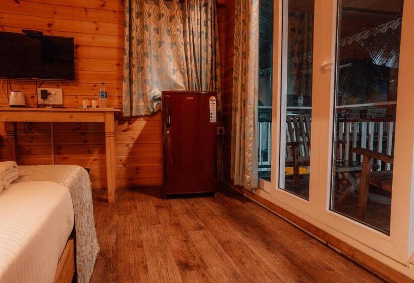 Standardzimmer mit Poolblick, Obrigado Cottages