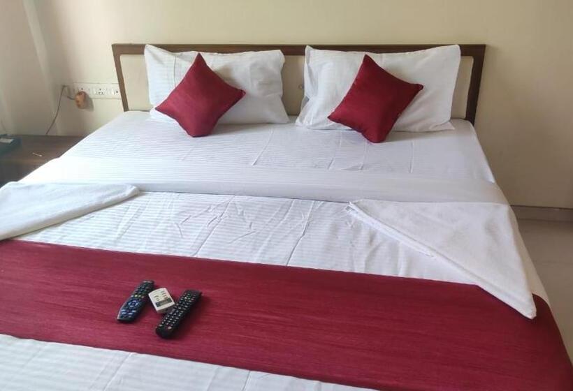キングサイズベッドのデラックスルーム, Atithi Service Apartment