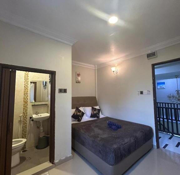 Номер Deluxe, Rumah Tamu Tepi Pantai