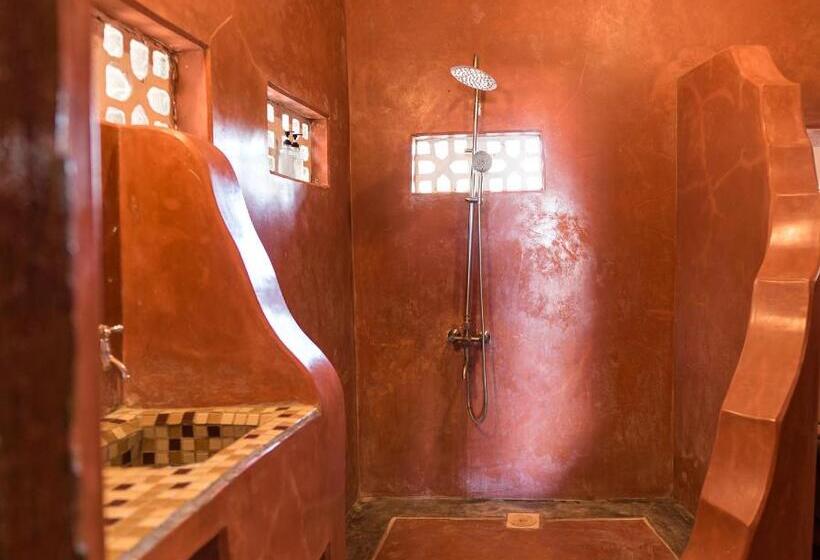 اتاق استاندارد سه تخته با چشم‌انداز باغ, Pili Pili Beach Bungalows