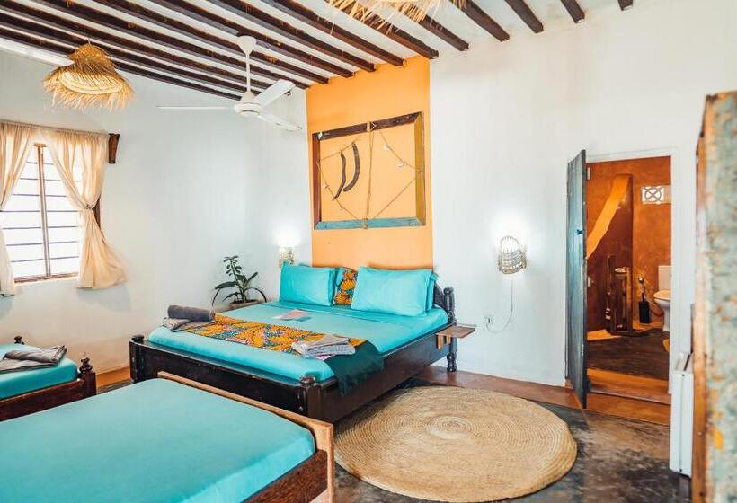 اتاق استاندارد چهارنفره با چشم‌انداز باغ, Pili Pili Beach Bungalows