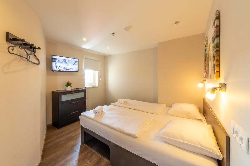 מיטת קינג בסוויטה, Crowne Plaza Shanghai, An Ihg