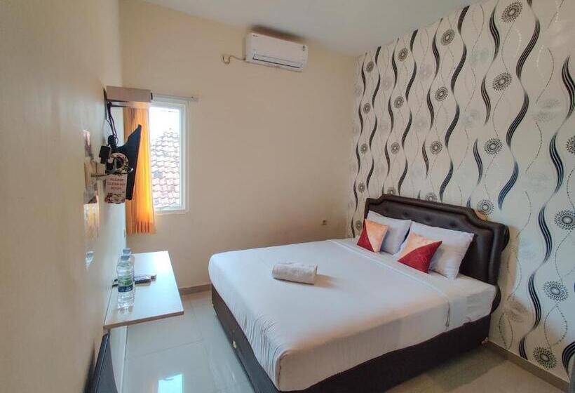 Номер Deluxe, Ayuning Guest House Syariah Semarang Mitra Reddoorz
