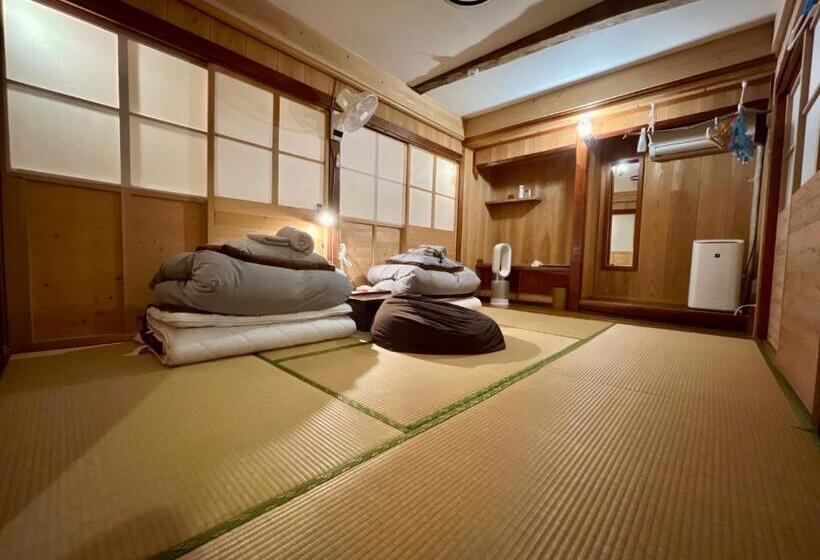 Дом 2 Спальни, 奄美ゲストハウス Hub A Nice Inn