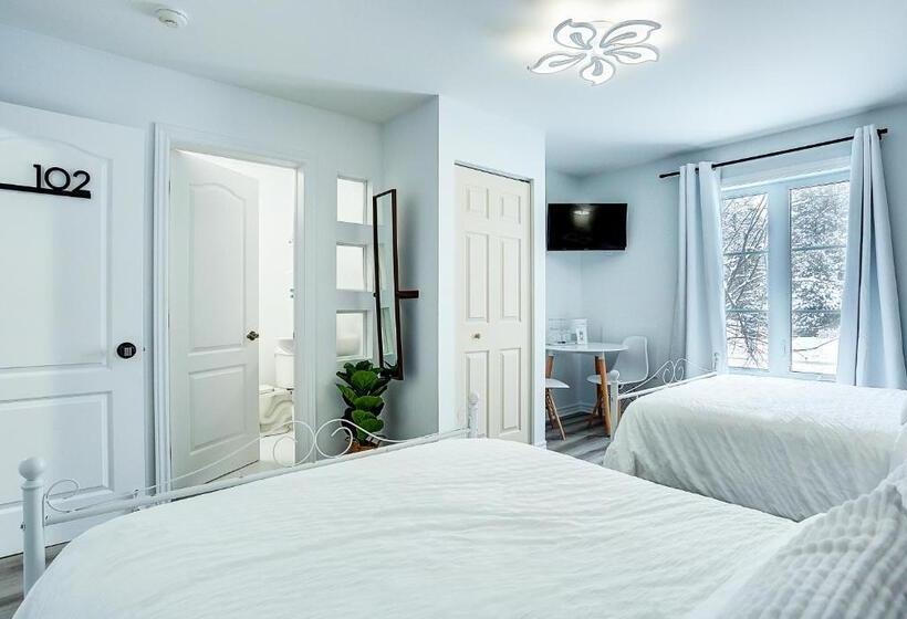 デラックスの４人部屋, Le 900 Tremblant Inn Cafe And Bistro