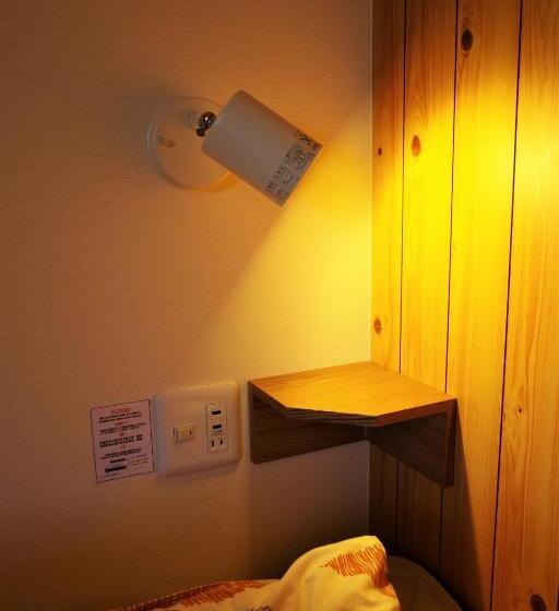 Кровать в Общей Комнате, K S House Hokkaido  Asahidake Onsen Hostel
