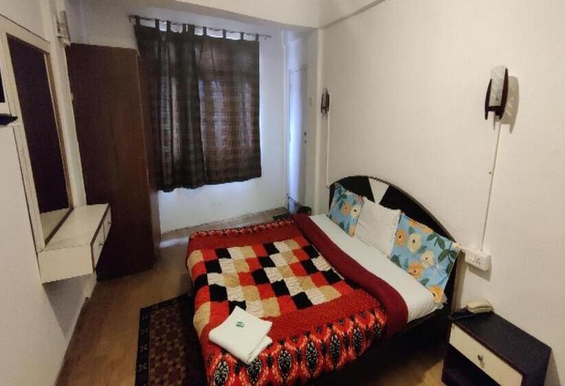 디럭스 트리플 룸, Capital O 8272 Hotel Pratigya Residency