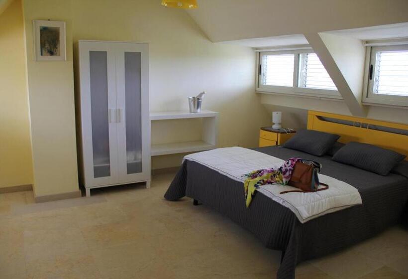اتاق استاندارد چهارنفره با چشم‌انداز باغ, Sicilia Bedda B&b