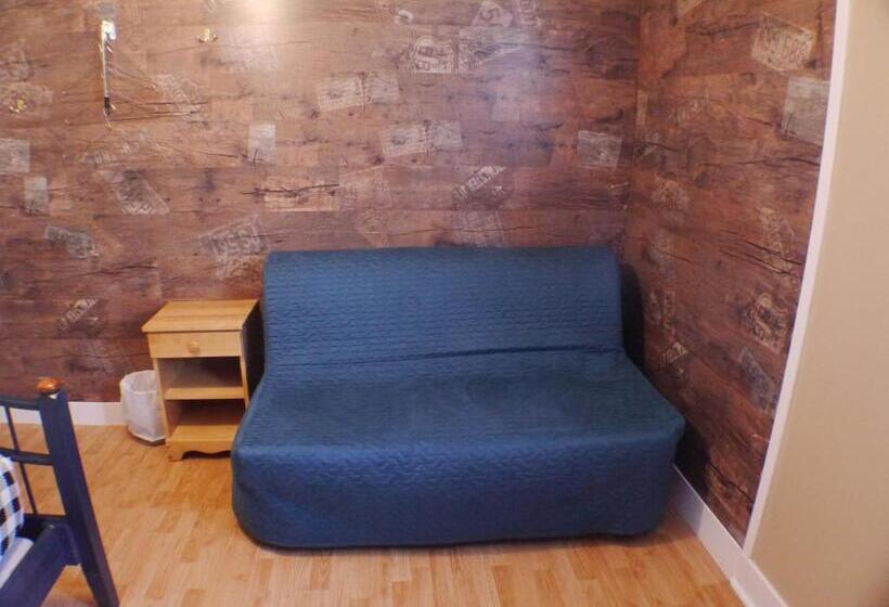 Бунгало Стандарт 3 Спальни, Auberge Jeunesse à Loulou