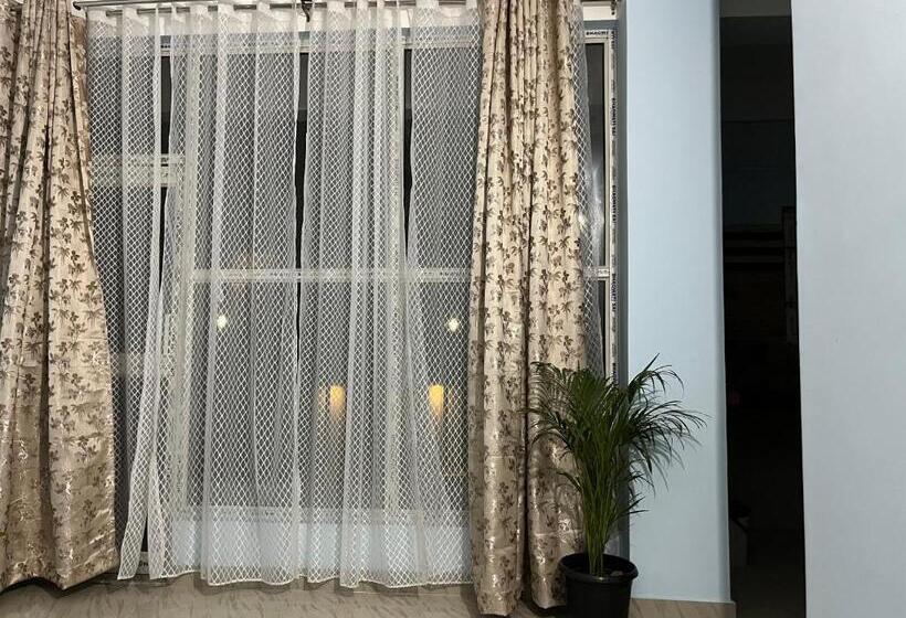آپارتمان 1 خوابه با بالکن, Beltola Serenity Homestay