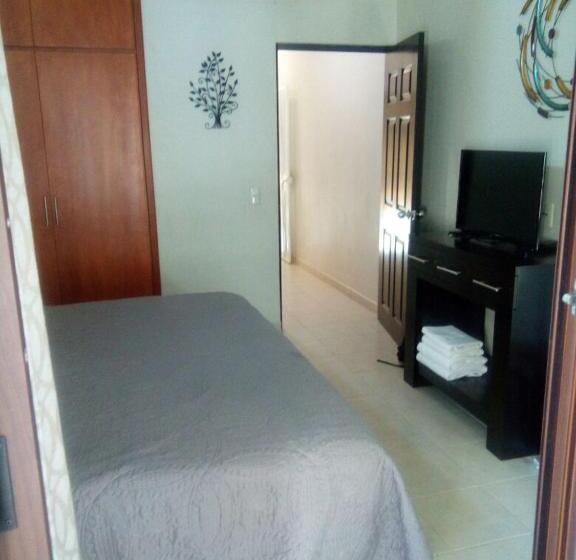 Quarto Basic, Y Suites Los Encantos