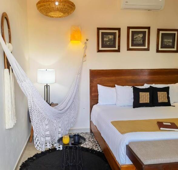 מיטת קינג בסוויטה, Le Muuch Hotel Boutique