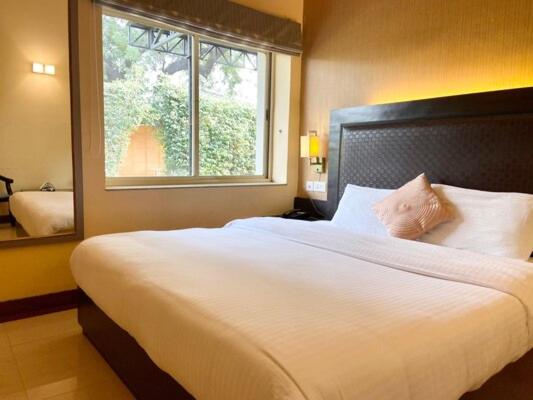 اتاق استاندارد با چشم‌انداز باغ, Status Club Resort