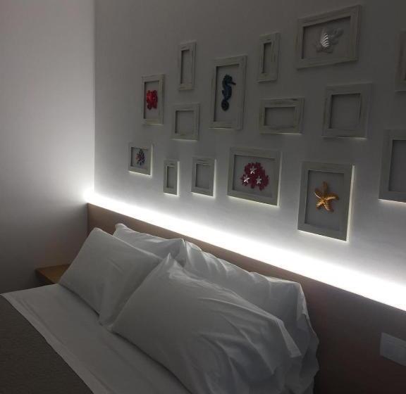 标准三人间, Le Rondini House