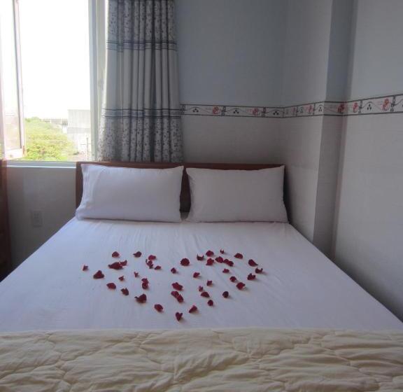اتاق استاندارد چهار تخته, Ngan Giang Guest House