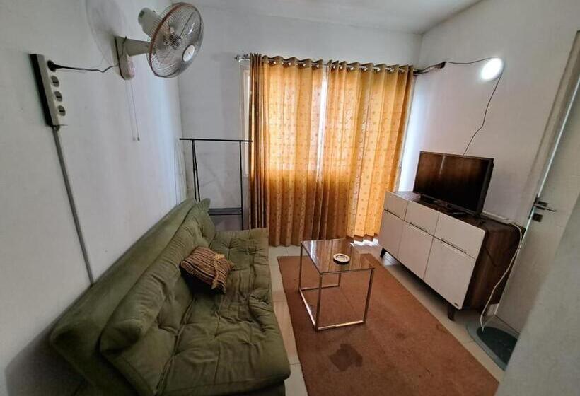 Номер Deluxe, Oyo Life 93106 Apartement Grand Sentraland By Andi