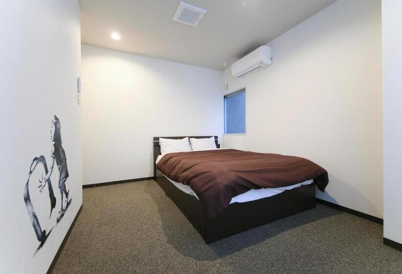 共用浴室的经济型房间, Roots Hostel