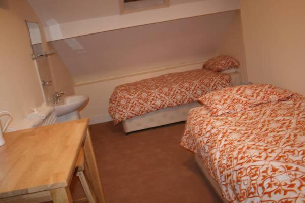 Четырехместный номер эконом класса с общей ванной комнатой, Bayside Guest House