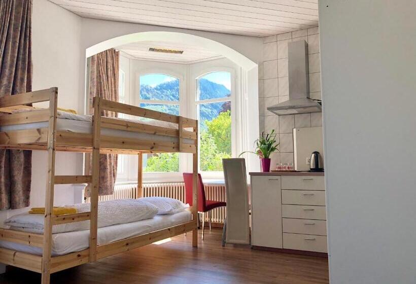 اتاق استاندارد چهارنفره با بالکن, Interlaken Marco Hostel