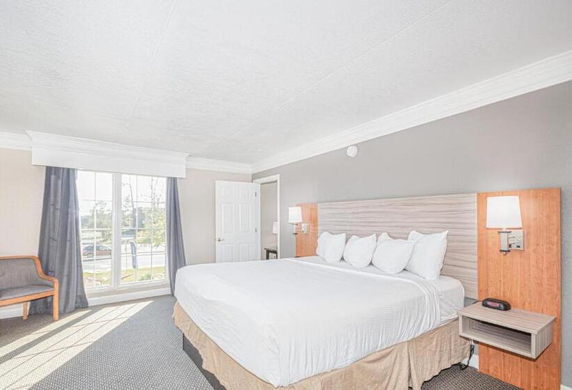 キングサイズベッドのデラックススイート, Casa Bella Inn & Suites Extended Stay