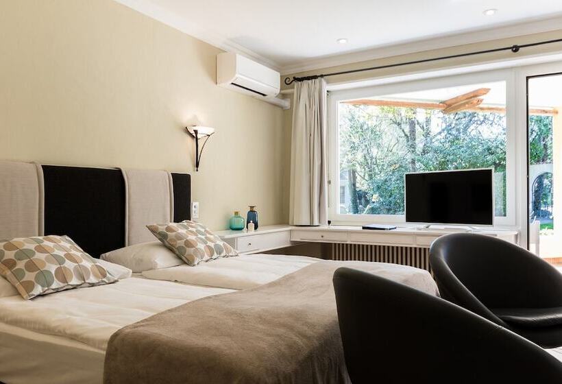 带1个卧室带花园景观的公寓, Albergo Losone