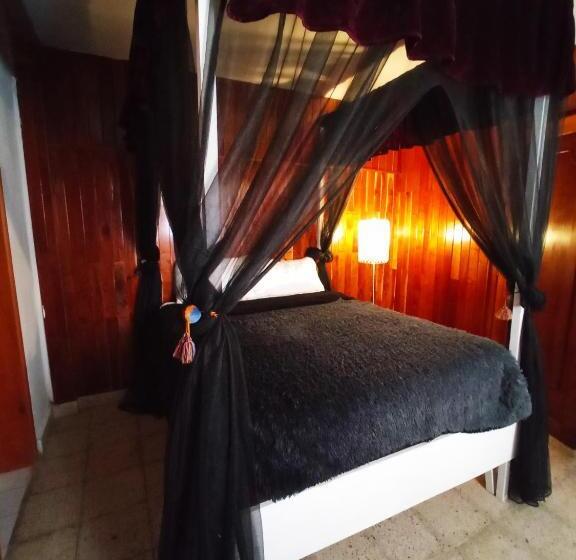 Quarto Triplo Estandar, Kaza Muta