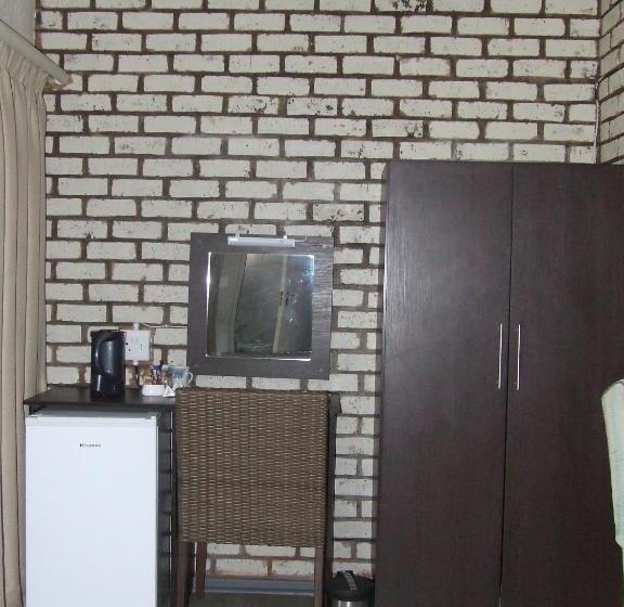디럭스 스위트 킹 침대, Kruger S Guest House