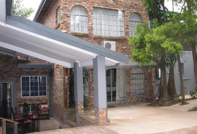 디럭스 스위트 킹 침대, Kruger S Guest House
