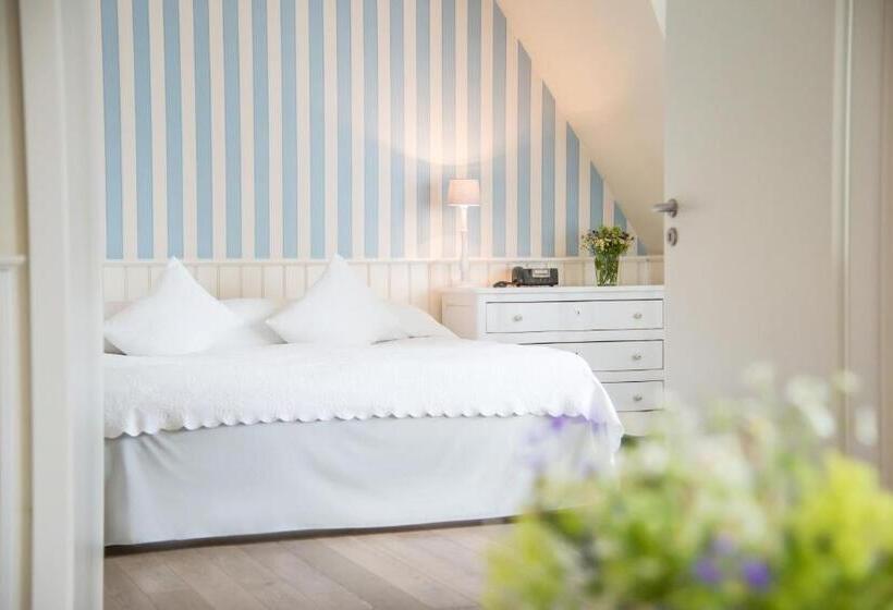 Junior Suite mit Meerblick, Strandhotel Glücksburg