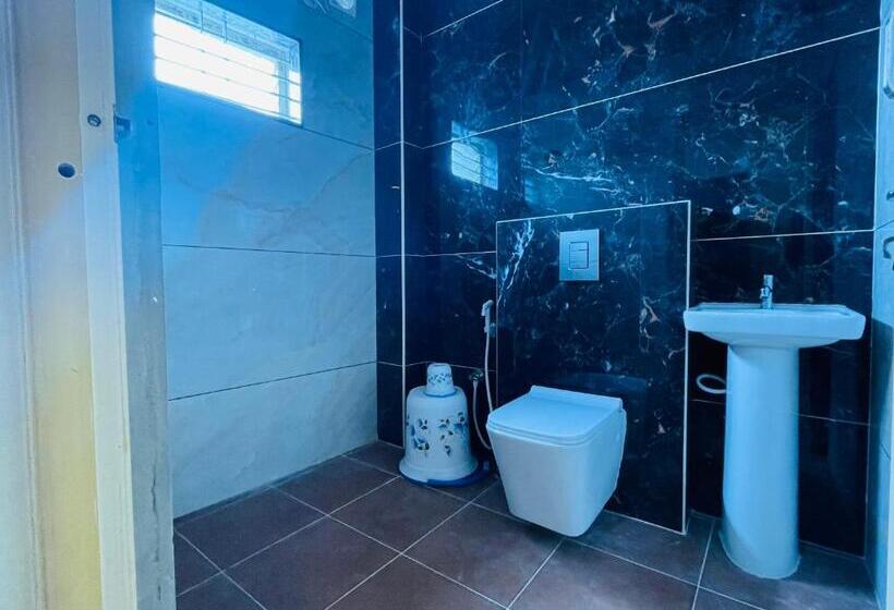 디럭스 트리플 룸, Staymaker Yashaswini Residency