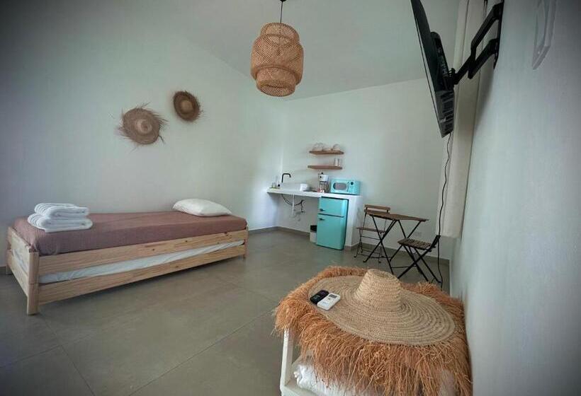 اتاق پریمیوم چهارنفره, 1 Corcega Beachfront Suites